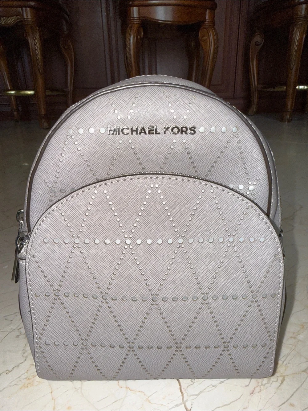 Michael Kors Light Gray Perforated Mini Backpack